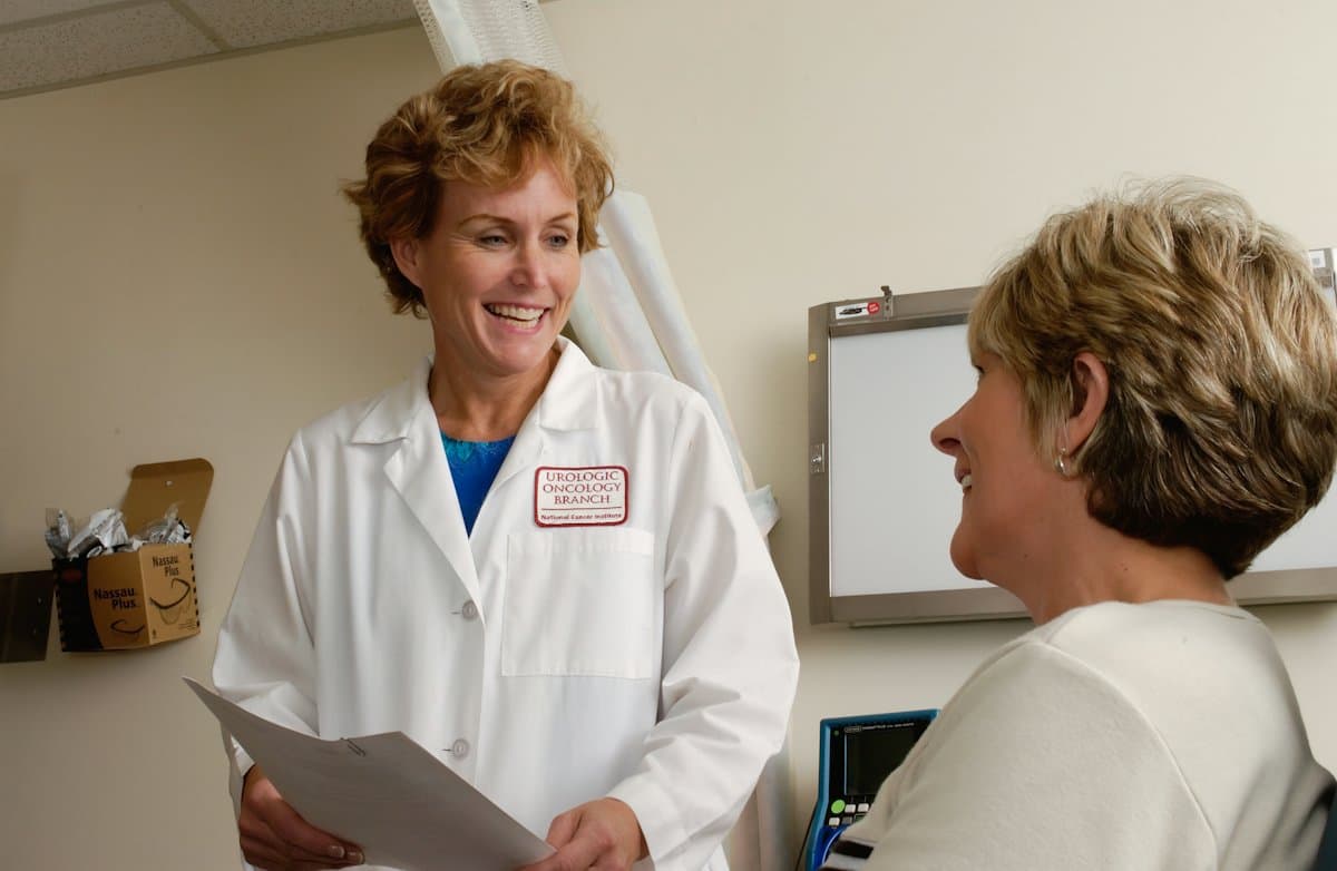 A doctor talking with a patient